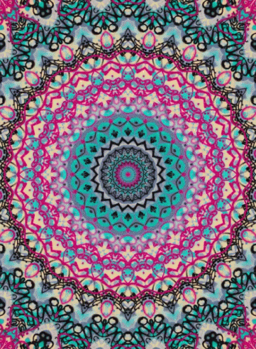 A Colorful Kaleidoscope With A Circular Pattern In The Center . GIF
