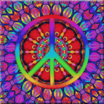 A Colorful Peace Sign Is Surrounded By A Kaleidoscope Of Flowers . GIF