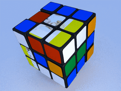 A Colorful Rubik 'S Cube With A Picture Of A Penguin On It GIF