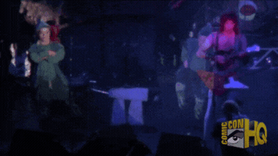 A Comic Con Hq Logo Is Displayed On A Dark Background GIF