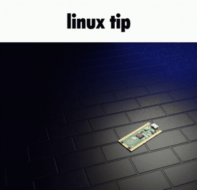 A Computer Chip Is Laying On A Brick Floor With The Words Linux Tip Below It GIF