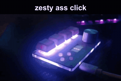 A Computer Keyboard With The Words Zesty Ass Click Written On It GIF