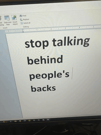 A Computer Monitor Displays A Page That Says Stop Talking Behind People 'S Backs GIF