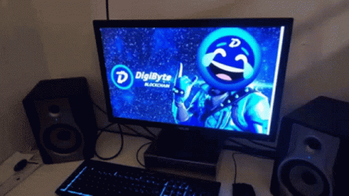 A Computer Monitor With A Smiley Face On It And The Word Digibyte GIF