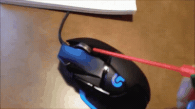 A Computer Mouse With The Letter G On It Is Being Cleaned GIF