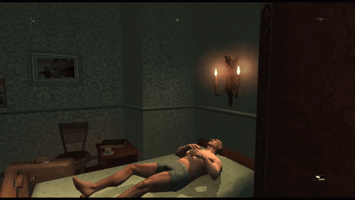 A Computer Screen Shows A Bedroom With A Bed And A Lamp On The Wall GIF