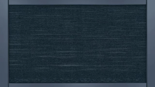 A Computer Screen Shows A Blue Sky With White Clouds And A Purple Sun GIF