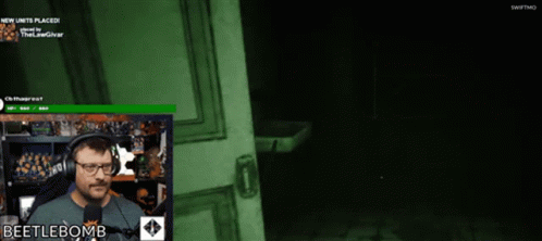 A Computer Screen Shows A Man With A Microphone And The Word Beetlebomb On It GIF