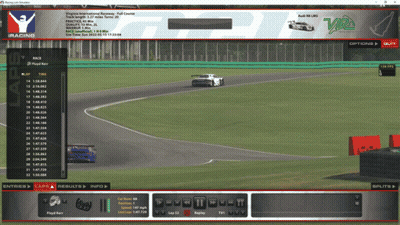 A Computer Screen Shows A Racing Game Being Played On A Track GIF