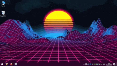 A Computer Screen Shows A Sunset Over A Grid GIF