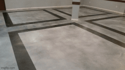 A Conference Room Table With Black Chairs And A Phone On Top GIF