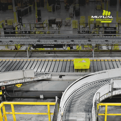 A Conveyor Belt In A Warehouse With The Word Robotic On It GIF