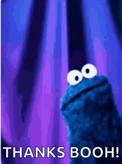 A Cookie Monster Says Thanks Booh With A Blue Background GIF