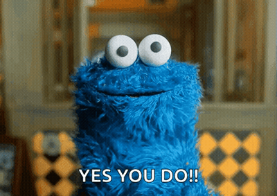 A Cookie Monster Says " Yes You Do " In Front Of A Window GIF