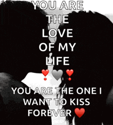 A Couple Kissing With The Words " You Are The Love Of My Life " GIF