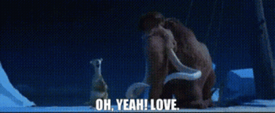 A Couple Of Animals Standing Next To Each Other With The Words Oh Yeah Love GIF