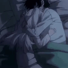 A Couple Of Anime Characters Are Hugging Each Other While Laying In Bed . GIF