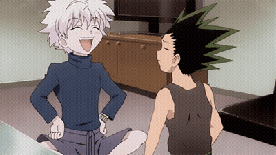 A Couple Of Anime Characters Are Sitting On The Floor One Is Laughing And The Other Has A Serious Look On His Face GIF