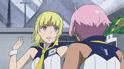 A Couple Of Anime Characters Are Standing Next To Each Other And Talking To Each Other . GIF