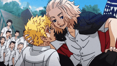 A Couple Of Anime Characters Standing Next To Each Other In Front Of A Crowd Of People . GIF