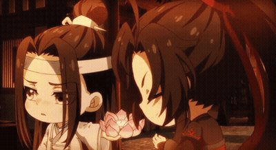 A Couple Of Anime Characters With One Holding A Flower GIF