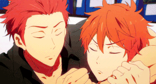 A Couple Of Anime Characters With Red Hair Are Hugging Each Other GIF