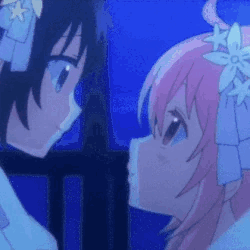 A Couple Of Anime Girls Are Standing Next To Each Other And Kissing . GIF