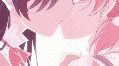 A Couple Of Anime Girls Kissing Each Other On The Cheek . GIF