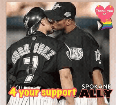 A Couple Of Baseball Players Kissing With The Words Spokane 4 Your Support Ally GIF