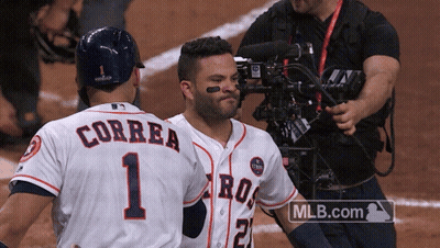 A Couple Of Baseball Players One Of Whom Has Correa On The Back Of His Jersey GIF