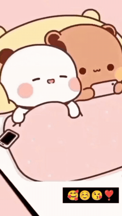 A Couple Of Cartoon Bears Are Laying On A Bed With A Cell Phone . GIF