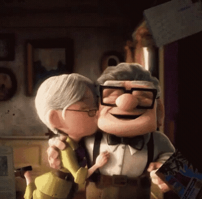A Couple Of Cartoon Characters Are Kissing Each Other GIF