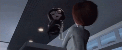 A Couple Of Cartoon Characters Are Standing Next To Each Other And Looking At Each Other . GIF