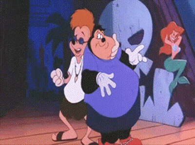 A Couple Of Cartoon Characters Are Standing Next To Each Other On A Stage . GIF