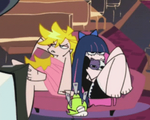 A Couple Of Cartoon Characters Laying On A Couch Looking At A Television GIF