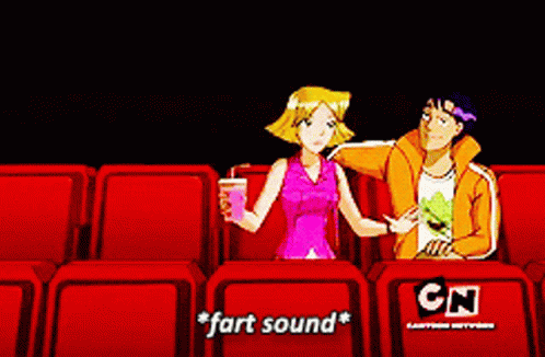 A Couple Of Cartoon Characters Sitting In Red Seats With Cn Written On The Seats GIF