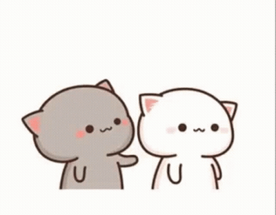 A Couple Of Cats Are Standing Next To Each Other And One Of Them Is Touching The Other 'S Face . GIF