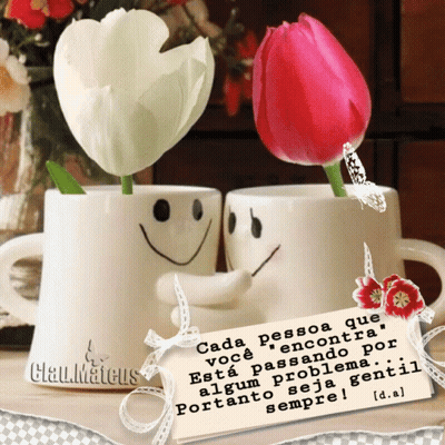 A Couple Of Cups With Smiley Faces On Them And Flowers In Them GIF