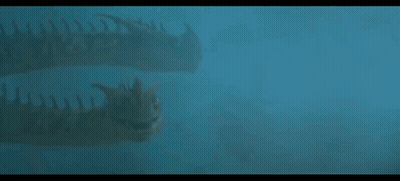 A Couple Of Dinosaurs Swimming In The Water . GIF