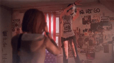A Couple Of Girls Are Standing Next To Each Other In A Room . GIF
