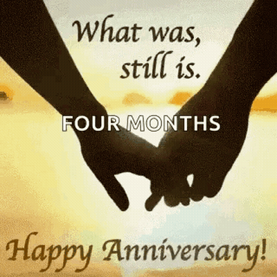 A Couple Of Hands Holding Each Other 'S Fingers On A Happy Anniversary Card . GIF
