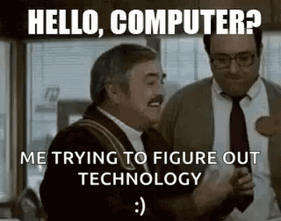 A Couple Of Men Are Standing Next To Each Other In A Room And Laughing . GIF
