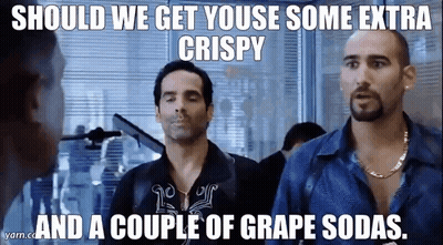 A Couple Of Men Are Standing Next To Each Other With A Caption That Says Should We Get You Use Some Extra Crispy GIF