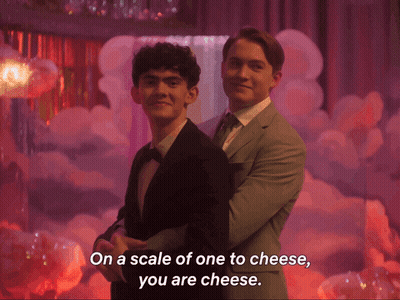 A Couple Of Men Hugging Each Other With The Words On A Scale Of One To Cheese You Are Cheese GIF