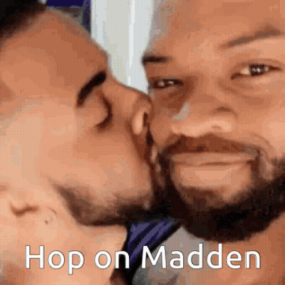A Couple Of Men Kissing With The Words Hop On Madden Written On The Bottom GIF