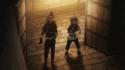 A Couple Of Men Standing In A Dark Room GIF