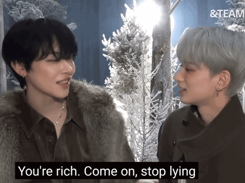 A Couple Of Men Standing Next To Each Other With The Words " You 'Re Rich Come On Stop Lying " Below Them GIF