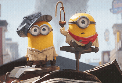 A Couple Of Minions Standing Next To Each Other One Wearing A Hat GIF
