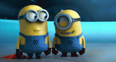 A Couple Of Minions Standing Next To Each Other With One Wearing Overalls With The Number 10 On Them GIF