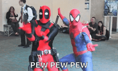 A Couple Of People Dressed Up As Deadpool And Spider-Man GIF